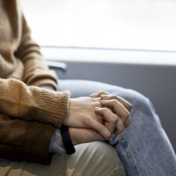 holding hands while grieving