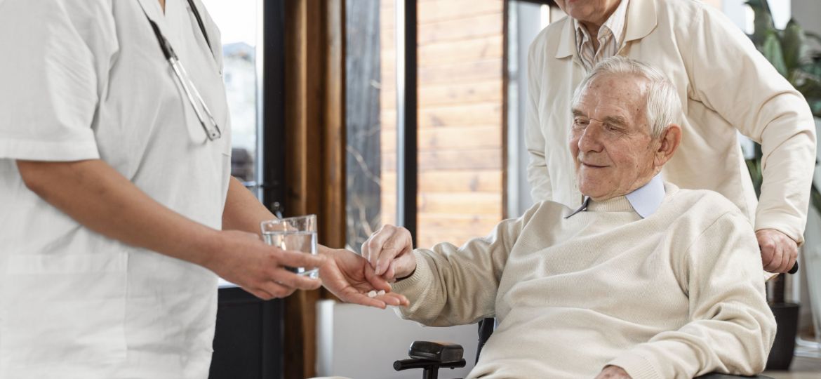 Husband and wife in nursing home with nurse