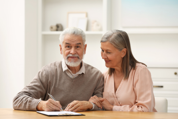 couple signing a will vs. trust document